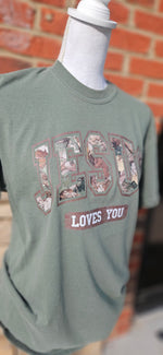Load image into Gallery viewer, Camo Jesus Loves You on Comfort Colors
