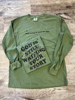 Load image into Gallery viewer, God is Still Writing Your Story  - Pocket Print Tee on Comfort Colors (Shown on Hemp)
