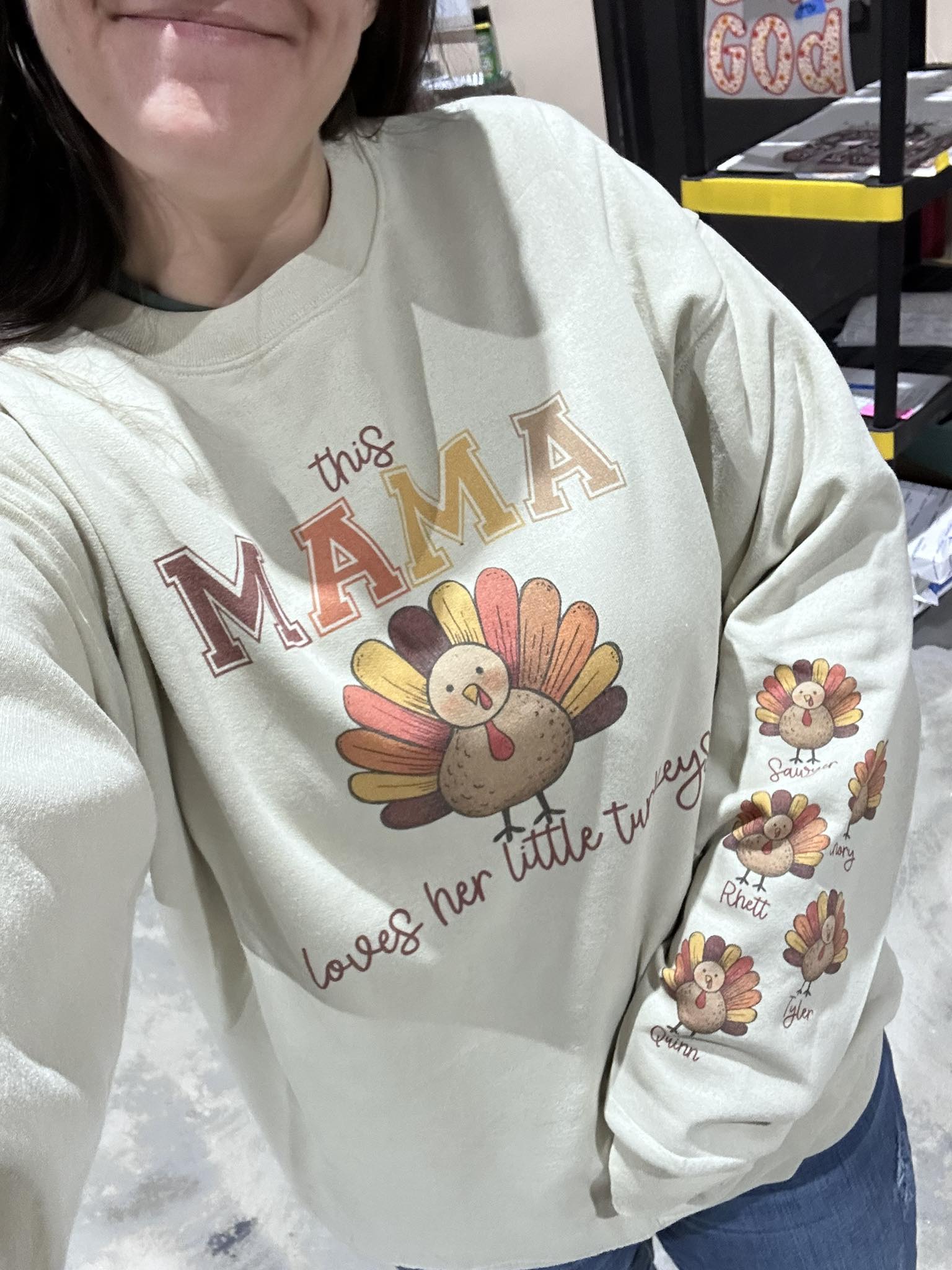This Mama Loves Her Little Turkeys Customizable Sweatshirt with Optional Names on Sleeve on Sand