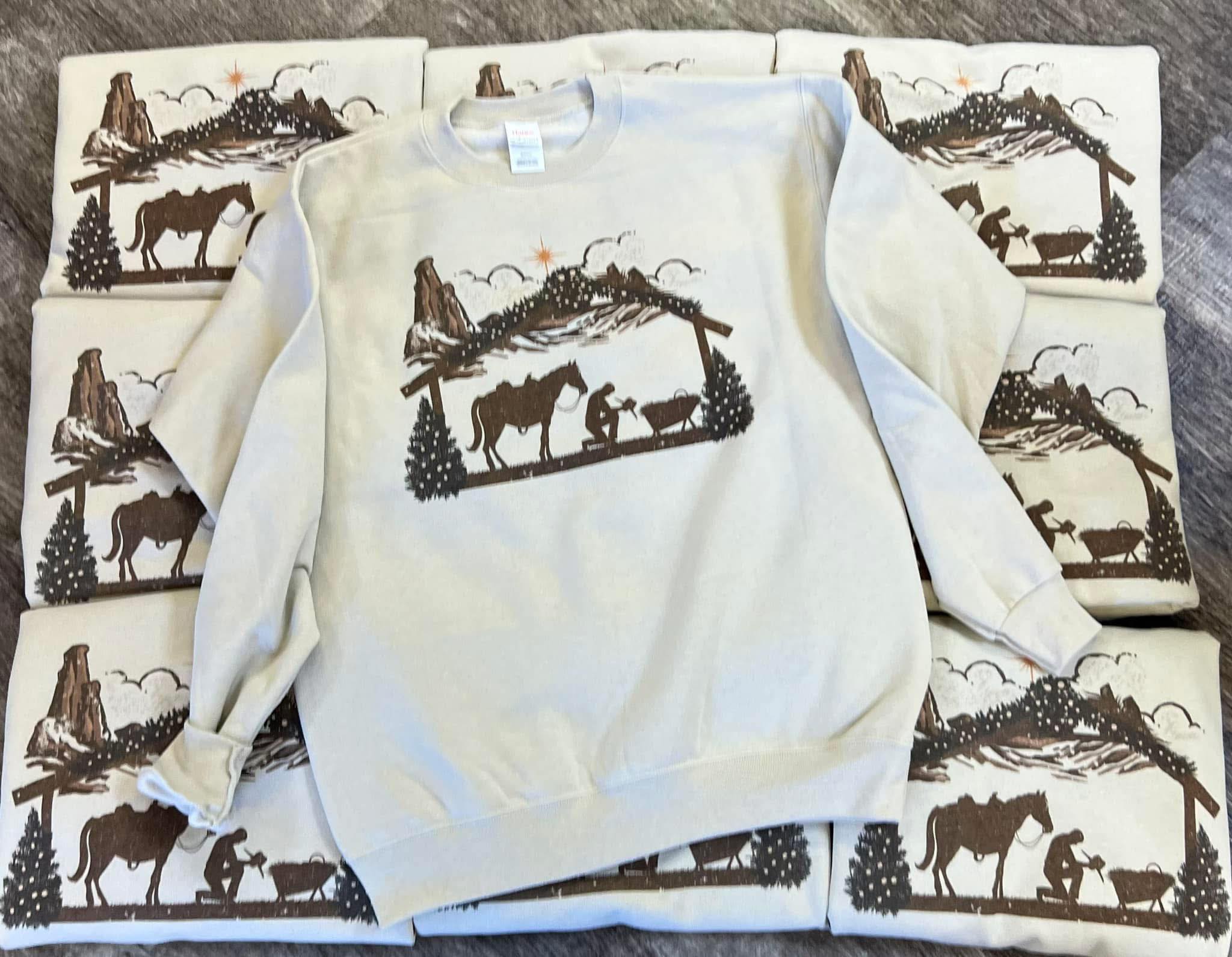 Cowboy Christmas Sweatshirt on Sand