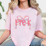 Load image into Gallery viewer, Preppy Bow Grade Level Tees on Comfort Colors (Shown on Blossom)
