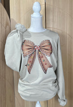 Load image into Gallery viewer, Gingerbread Bow Sweatshirt on Sand
