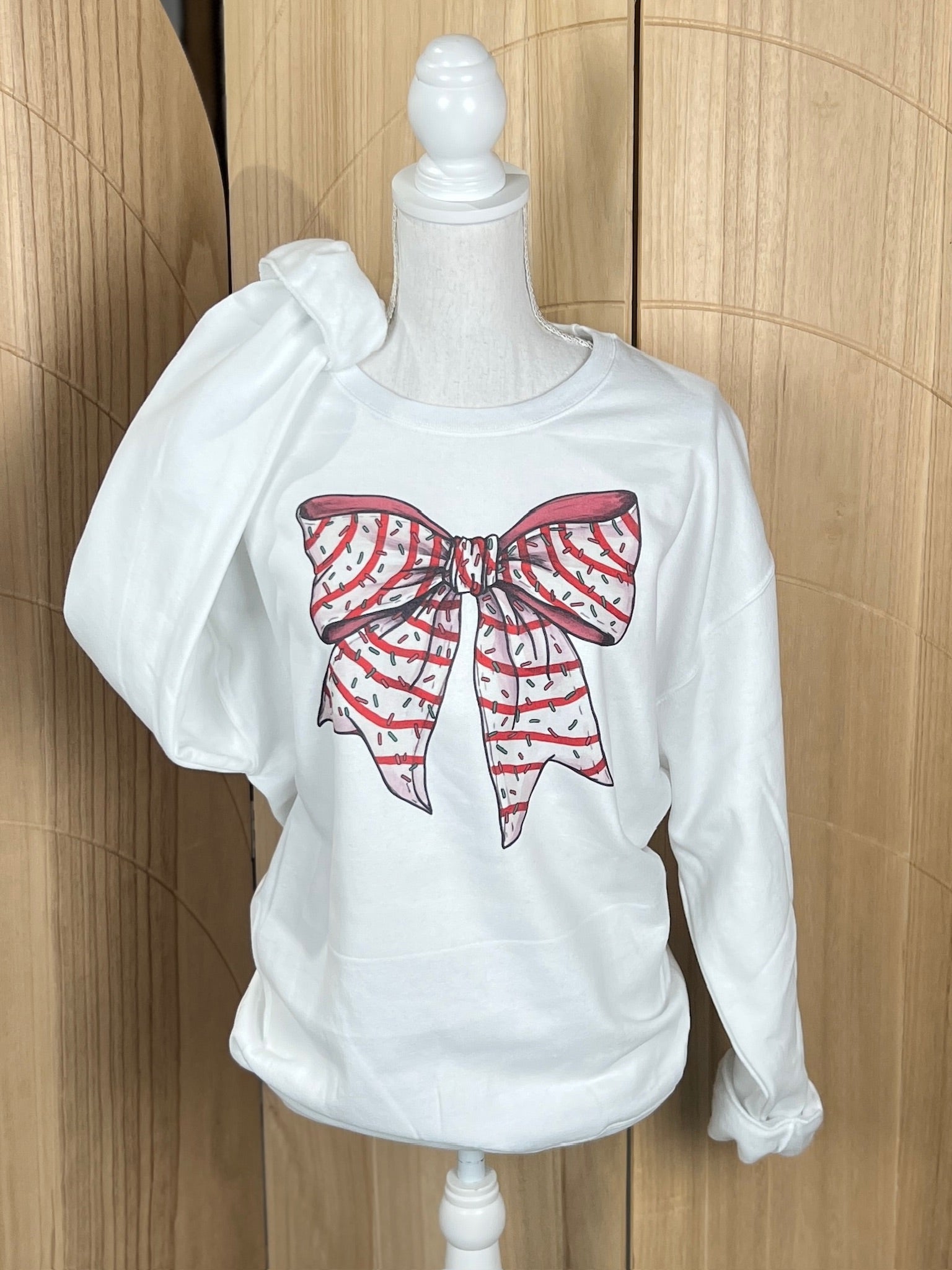 Christmas Tree Cake Bow Sweatshirt on White