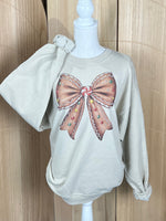 Load image into Gallery viewer, Gingerbread Bow Sweatshirt on Sand
