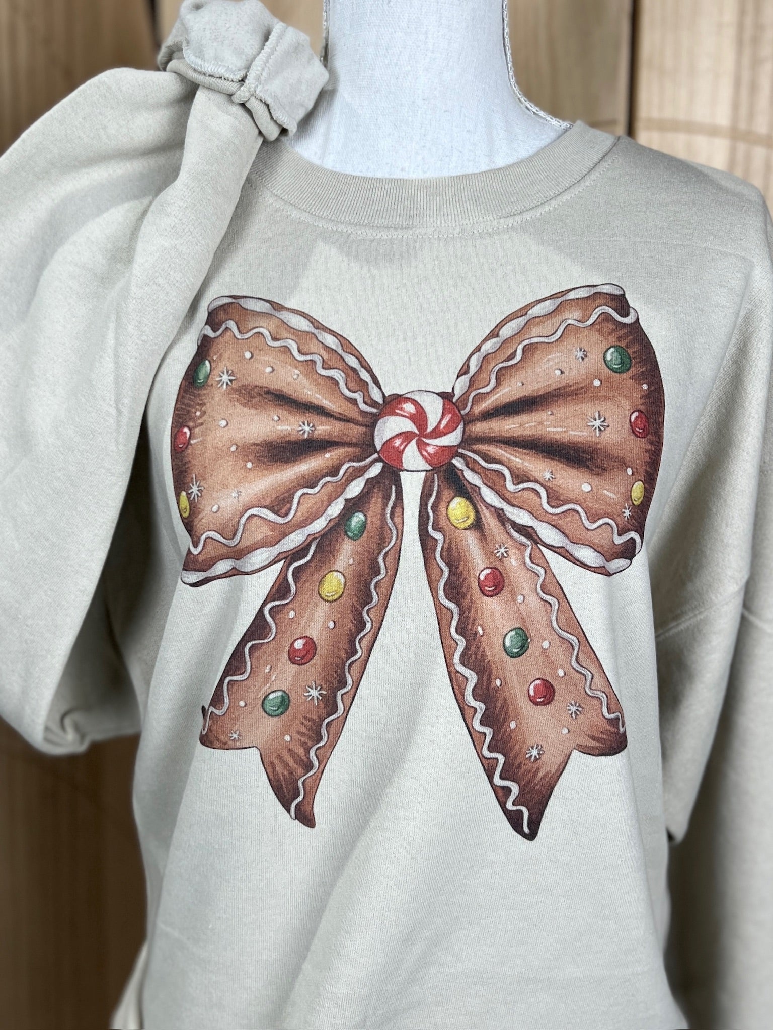 Gingerbread Bow Sweatshirt on Sand