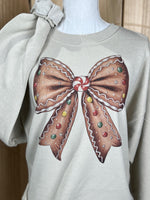 Load image into Gallery viewer, Gingerbread Bow Sweatshirt on Sand
