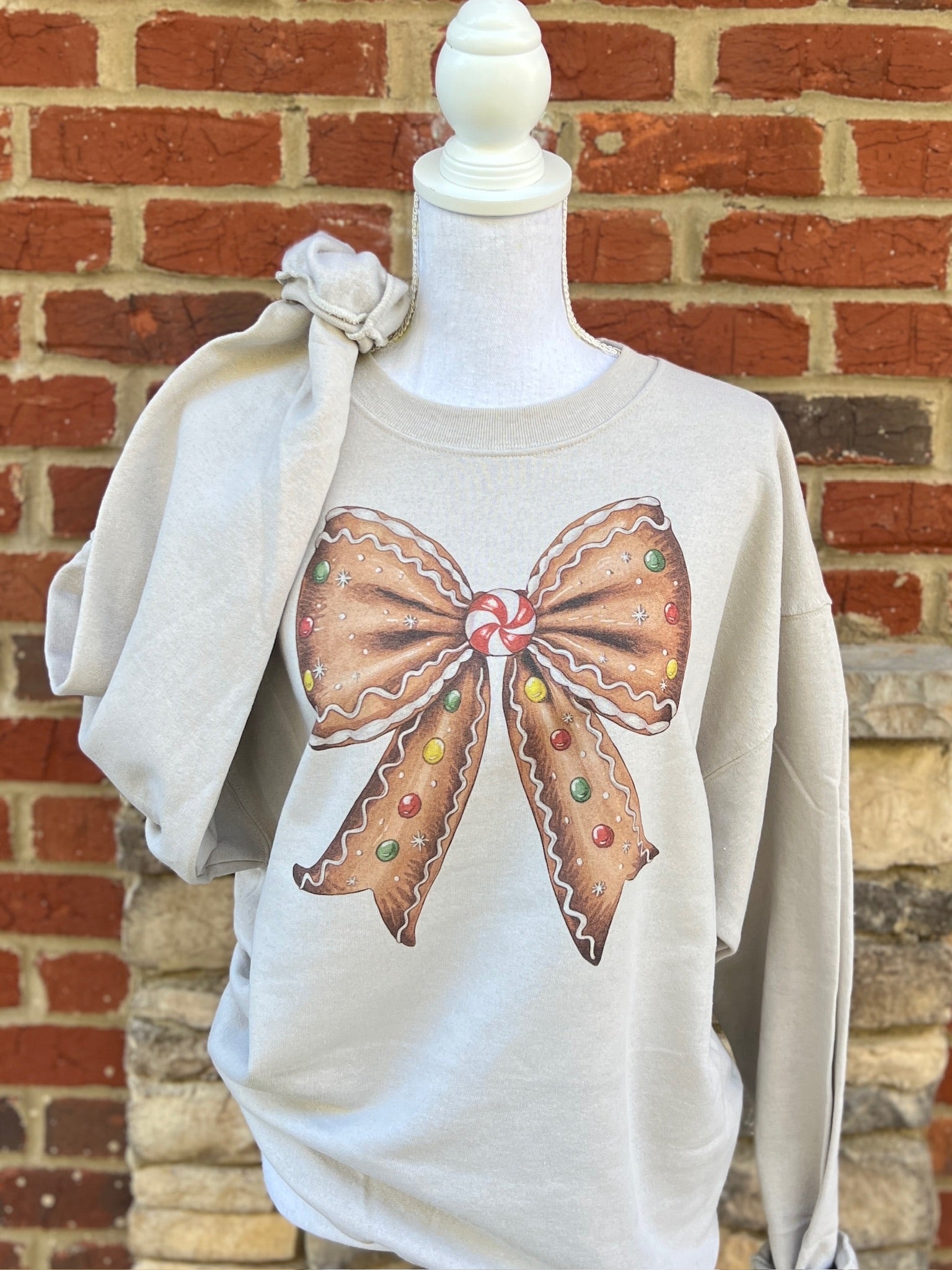 Gingerbread Bow Sweatshirt on Sand