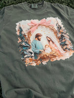 Load image into Gallery viewer, Painted Nativity on Comfort Colors Blue Spruce or Blossom
