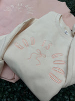 Load image into Gallery viewer, EMBROIDERED: God Is Good With Bow on Jerzees Cream or Light Pink
