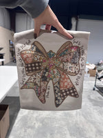 Load image into Gallery viewer, God Is Within Her Patchwork Bow on Sand
