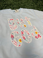 Load image into Gallery viewer, But God Floral with Lace Trim shown on Comfort Colors Chambray
