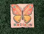 Load image into Gallery viewer, New Creation Butterfly on Tultex Heather Peach
