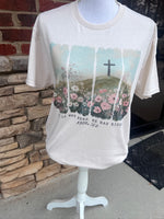 Load image into Gallery viewer, He Is Not Here He Has Risen Flower Field with Cross on Cream
