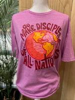Load image into Gallery viewer, Go Make Disciples Of All Nations Pink Text on Gildan Softstyle Heather Radiant Orchid
