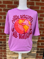 Load image into Gallery viewer, Go Make Disciples Of All Nations Pink Text on Gildan Softstyle Heather Radiant Orchid
