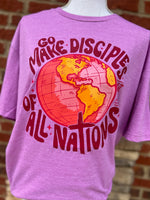 Load image into Gallery viewer, Go Make Disciples Of All Nations Pink Text on Gildan Softstyle Heather Radiant Orchid

