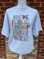 Load image into Gallery viewer, Teacher Alphabet on Ash Gray Tee
