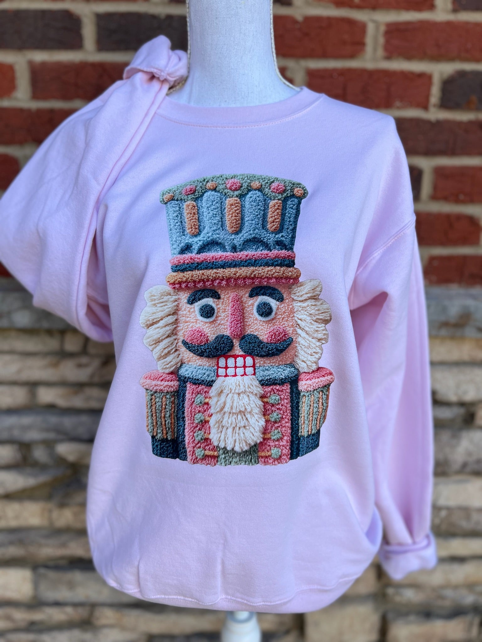 Nutcracker Sweatshirt on Light Pink