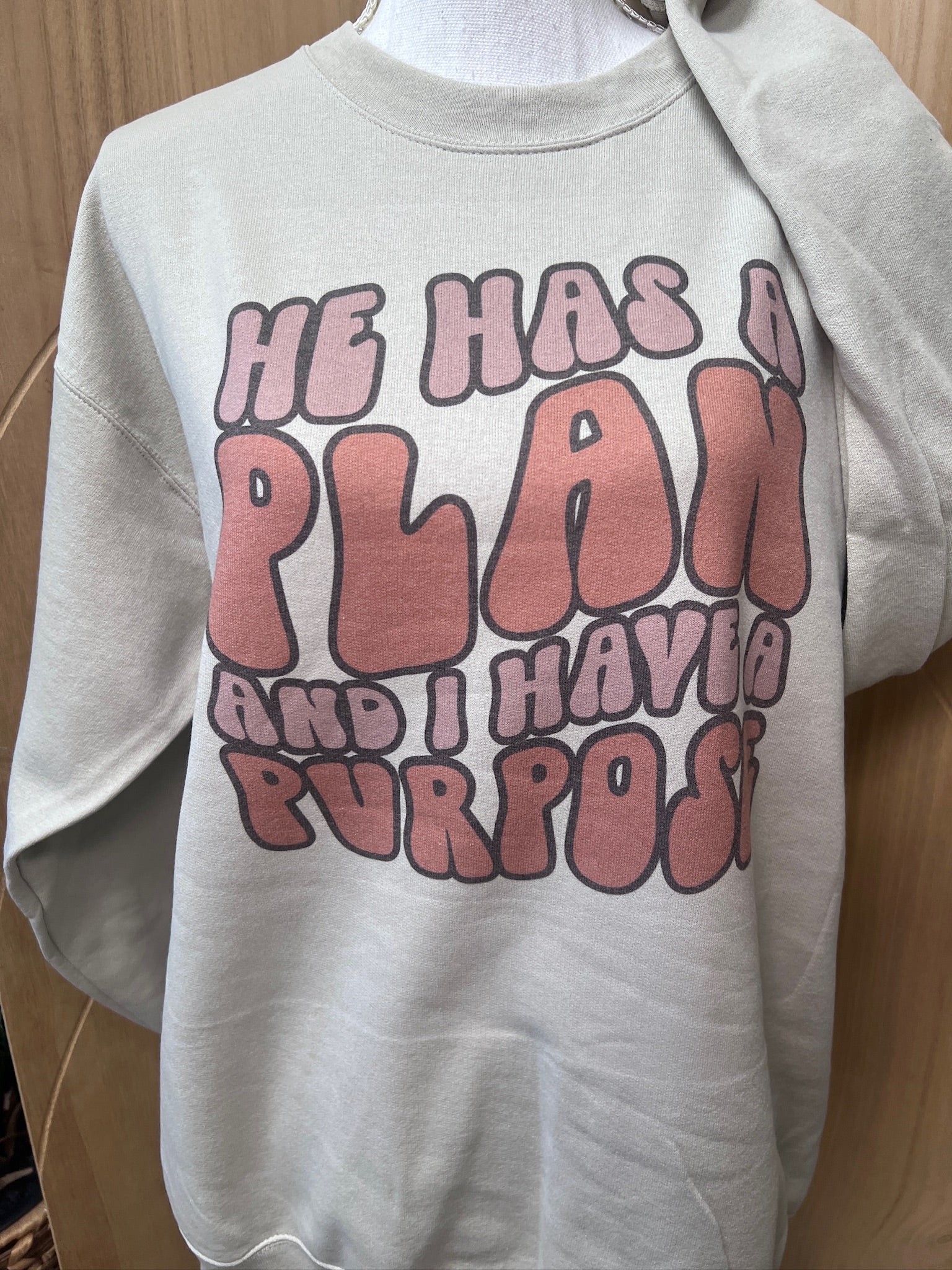 He Has A Plan Sweatshirt on Sand