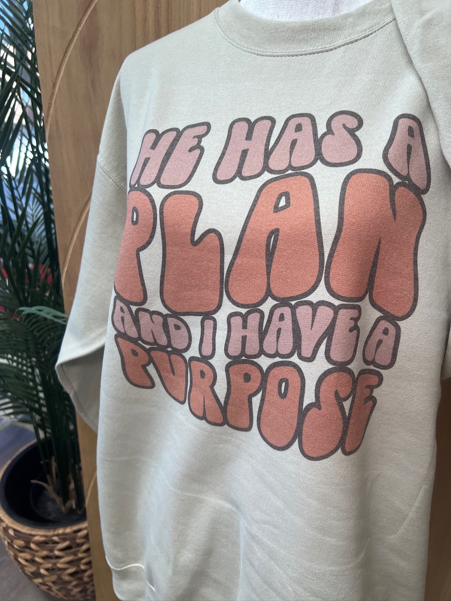 He Has A Plan Sweatshirt on Sand