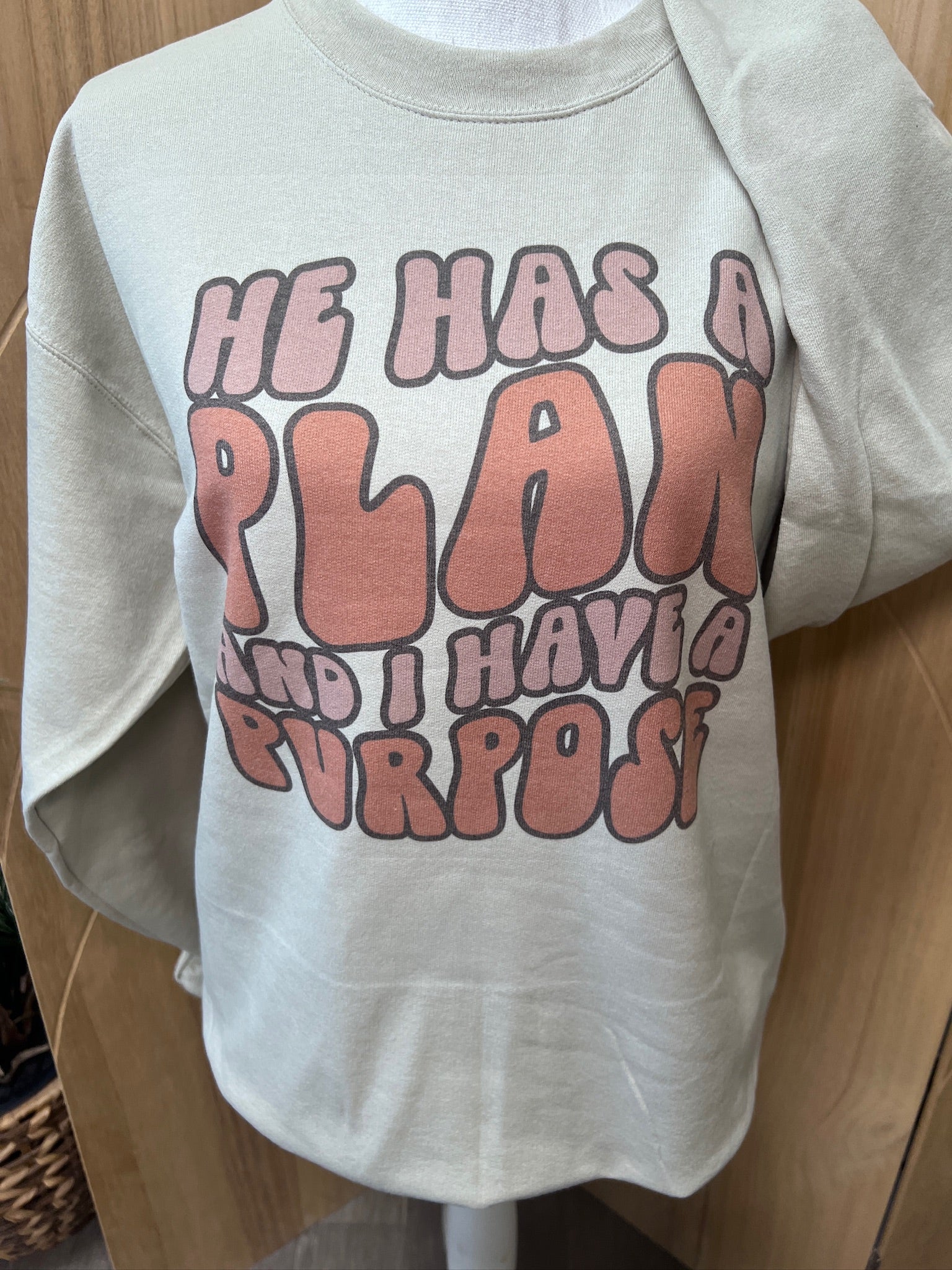 He Has A Plan Sweatshirt on Sand