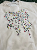 Load image into Gallery viewer, Christmas Lights Bow Sweatshirt on Cream
