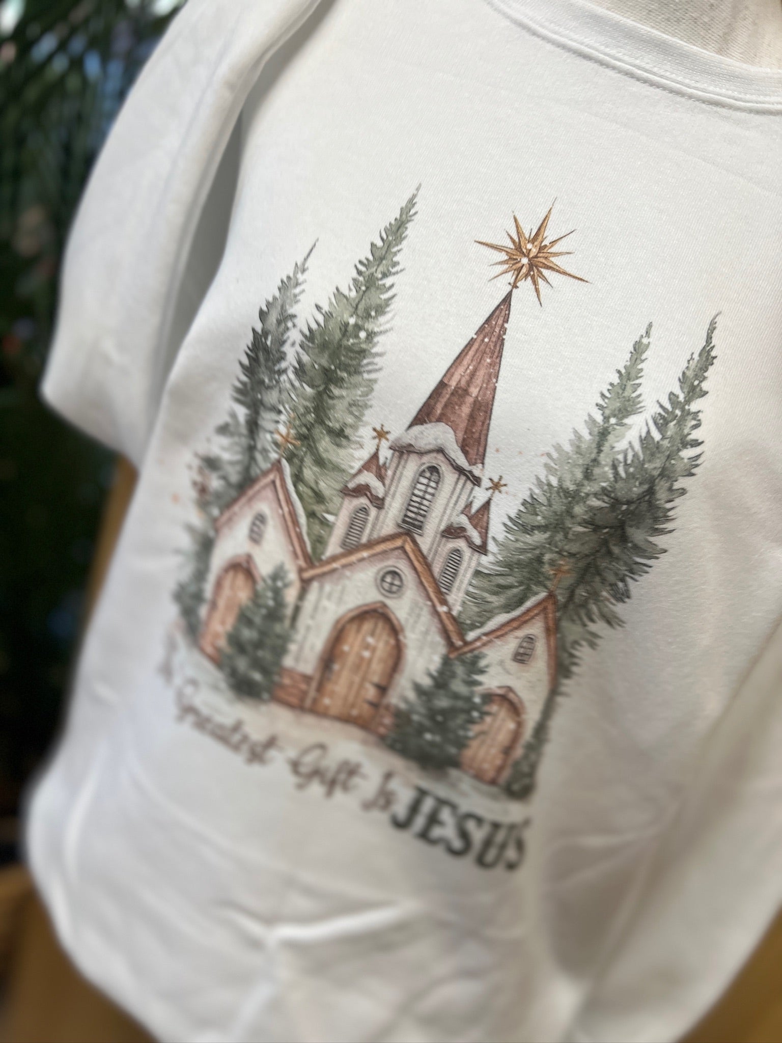 The Greatest Gift Is Jesus Sweatshirt on White
