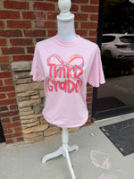 Load image into Gallery viewer, Preppy Bow Grade Level Tees on Comfort Colors (Shown on Blossom)

