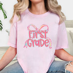 Load image into Gallery viewer, Preppy Bow Grade Level Tees on Comfort Colors (Shown on Blossom)
